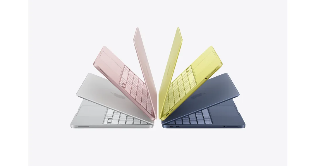 四部唔同顏色 MacBook Neo 排成弧形，展示銀色、粉紅、黃色同深藍機身