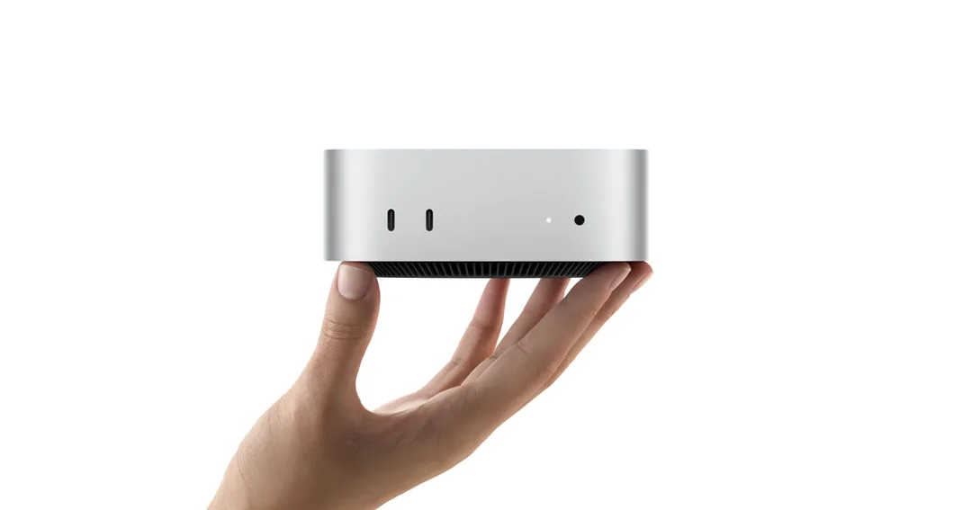 Mac mini 官方產品圖,展示細小機身同桌面定位