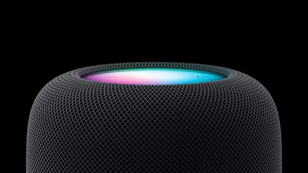 黑色背景前放有白色同午夜暗色 HomePod 第二代