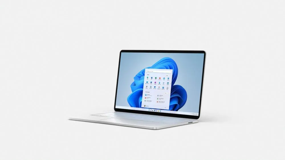 一部顯示 Windows 11 桌面嘅手提電腦官方圖片