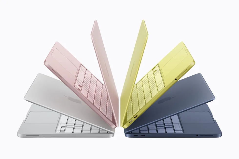 銀色、胭脂色、橘黃色同靛藍色 MacBook Neo 排成扇形